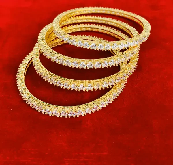 Buy Gold Plated Silver Stone Bangles Set
